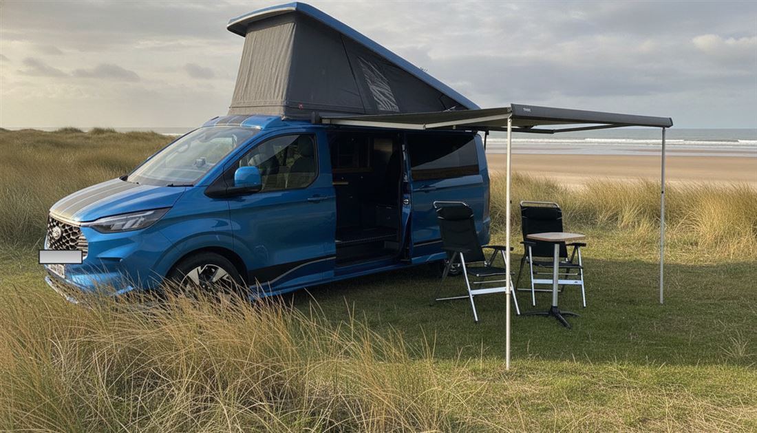 The camper set up with the awning out