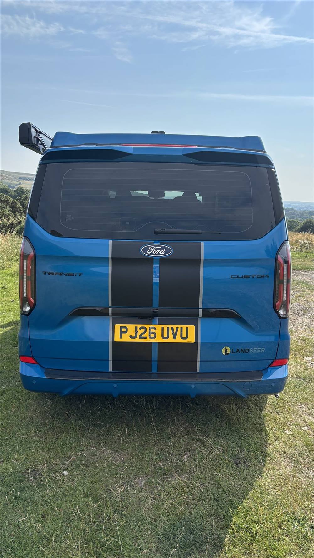 The rear of the van with the Landseer conversion badge