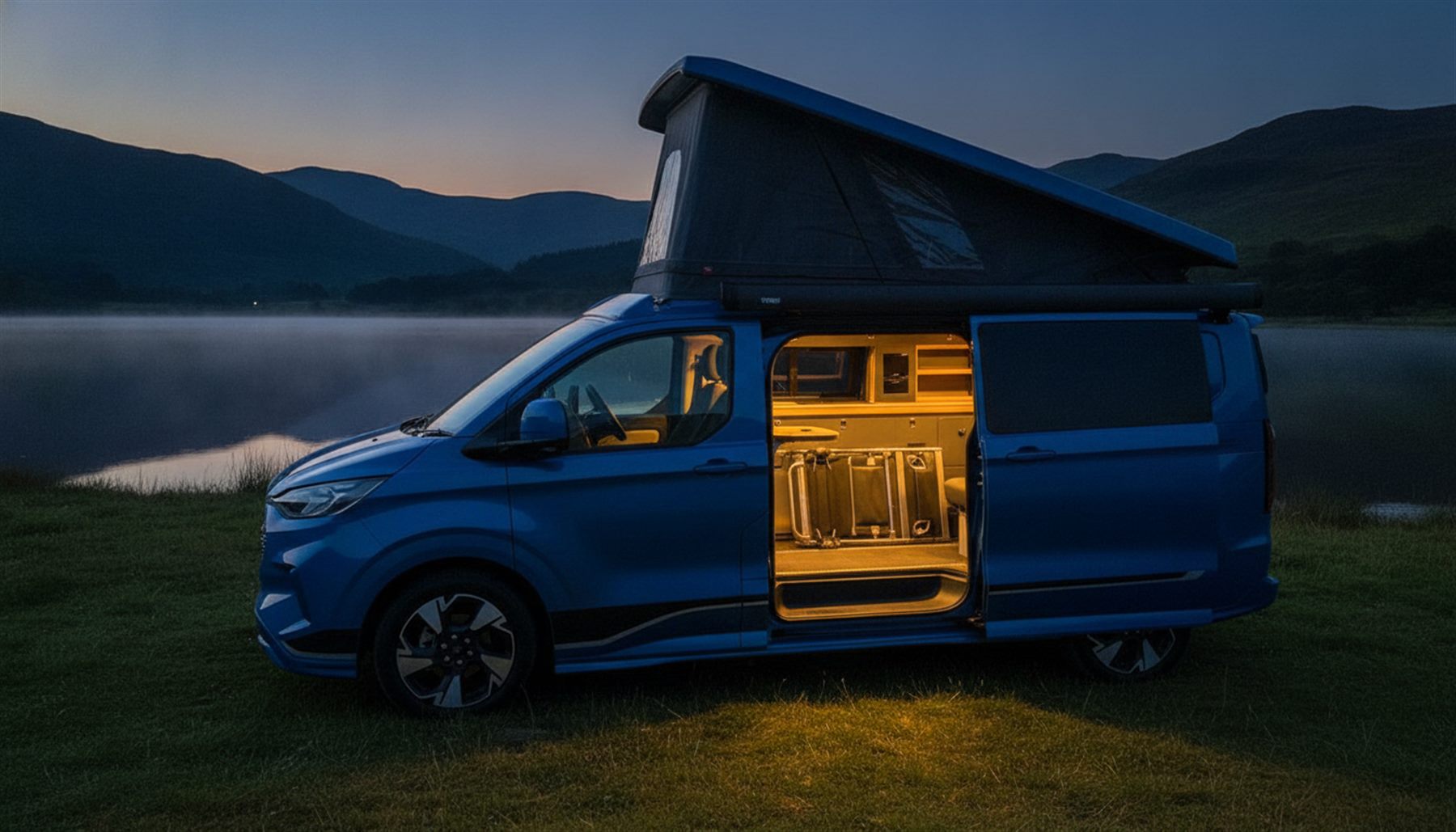 The van at blue hour with warm light glowing from inside