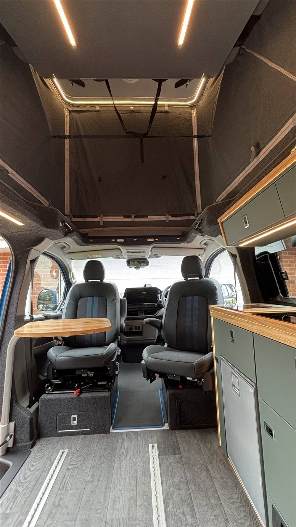 Cab seats swivelled round the oak table